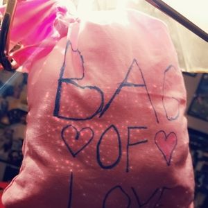 Purple bracelet and ( bag'o Love)